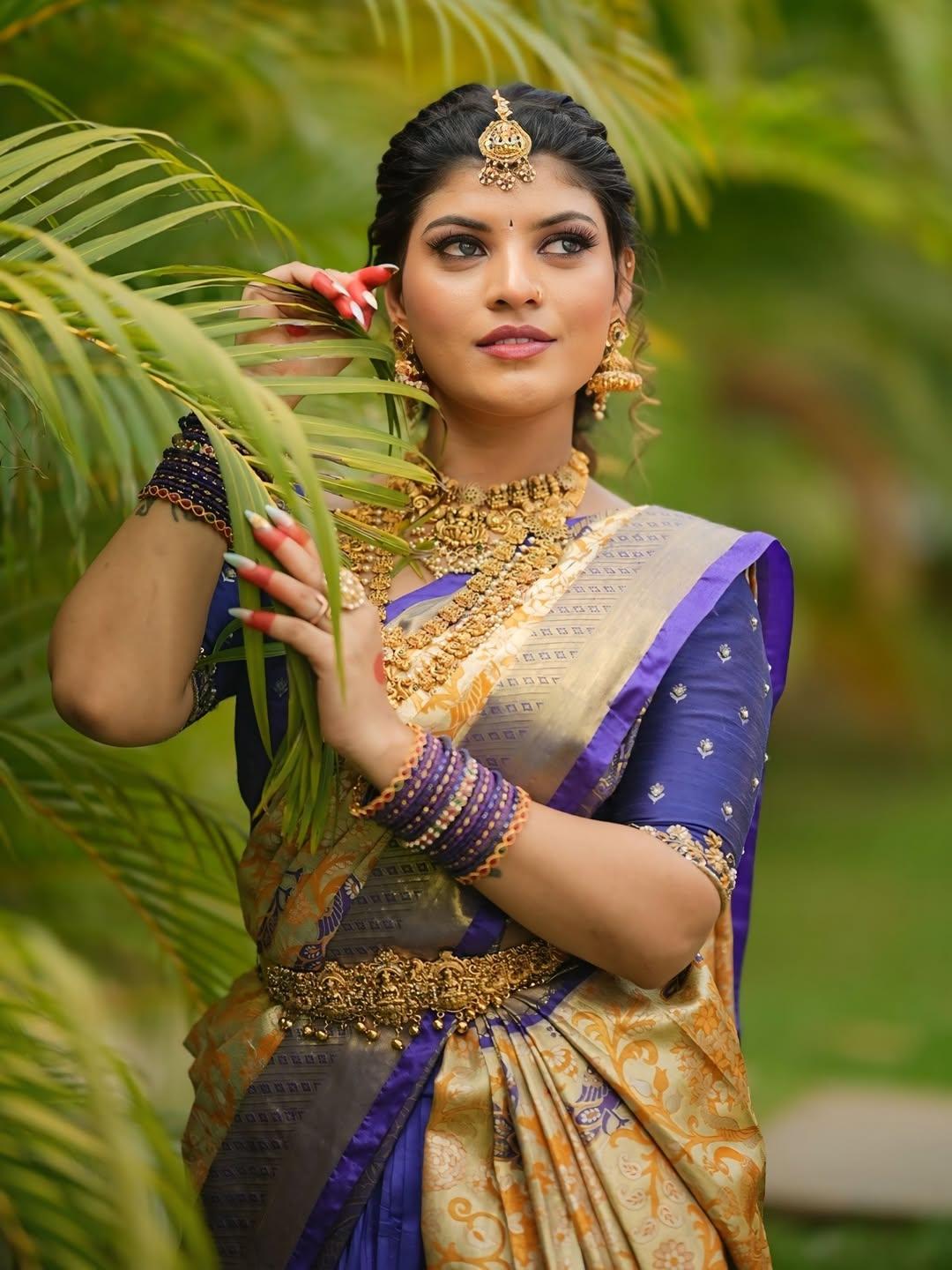 South Indian bride with traditional makeup and hairstyling